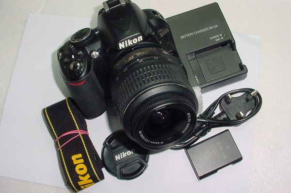 Nikon D3100 14.2MP Digital SLR Camera + Nikon 18-55mm F/3.5-5.6 GII DX Zoom Lens