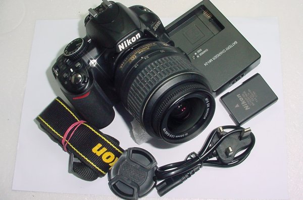 Nikon D3100 14.2MP Digital SLR Camera + Nikon 18-55mm F/3.5-5.6 GII DX Zoom Lens