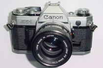 Canon AE-1 35mm Film Manual SLR Camera with Canon 50mm F/1.4 FD Lens