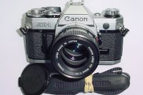 Canon AE-1 35mm Film Manual SLR Camera with Canon 50mm F/1.4 FD Lens