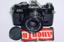 Canon AE-1 Program 35mm SLR Film Manual Camera + Canon 50/1.8 FD Lens in Black