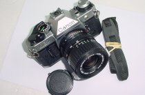 Canon AE-1 Program 35mm Film SLR Camera + Canon 35-70mm f/3.5-4.5 FD Zoom Lens