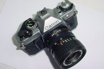 Canon AE-1 Program 35mm Film SLR Camera + Canon 35-70mm f/3.5-4.5 FD Zoom Lens