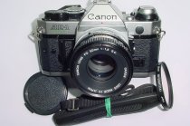 Canon AE-1 Program 35mm SLR Film Manual Camera + Canon 50mm F/1.8 FD S.C. Lens