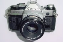 Canon AE-1 Program 35mm SLR Film Manual Camera + Canon 50mm F/1.8 FD S.C. Lens