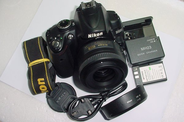 Nikon D5000 12.3 MP DX Digital SLR Camera with Nikon 35mm F/1.8G AF-S DX Lens