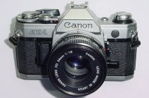 Canon AE-1 35mm SLR Film Manual Camera with Canon 50mm F/1.8 FD S.C. Lens