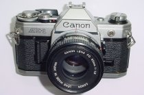 Canon AE-1 35mm SLR Film Manual Camera with Canon 50mm F/1.8 FD S.C. Lens