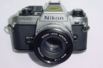 Nikon FG-20 35mm Film SLR Manual Camera with Nikon 50mm F/1.8 Series E Lens