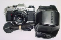 Olympus OM10 35mm Film SLR Manual Camera with Olympus 50/1.8 Zuiko Lens + MA