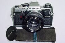 Olympus OM10 35mm Film SLR Manual Camera with Olympus 50/1.8 Zuiko Lens + MA