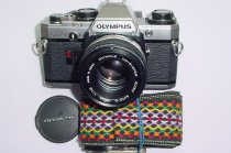 Olympus OM10 35mm Film SLR Manual Camera with Olympus 50/1.8 Zuiko Lens