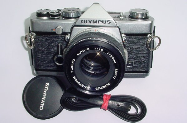 Olympus OM-1 MD 35mm Film SLR Manual Camera with Olympus 50/1.8 Zuiko Lens