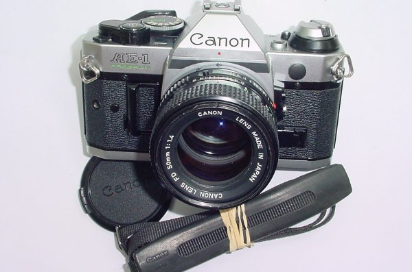 Canon AE-1 Program 35mm SLR Film Manual Camera with Canon 50mm F/1.4 FD S.S.C. Lens