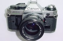 Canon AE-1 Program 35mm SLR Film Manual Camera with Canon 50mm F/1.4 FD S.S.C. Lens