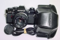 Olympus OM10 QUARTZ 35mm Film SLR Camera with 50mm F/1.8 Zuiko Lens - Black